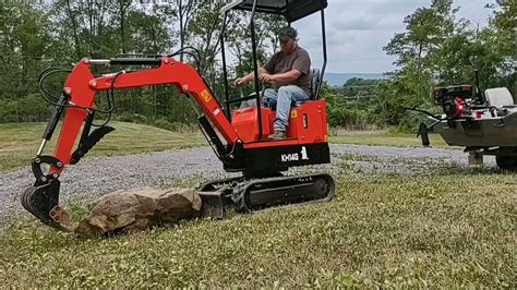 who makes groundhog mini excavators